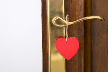 door with heart card hanging