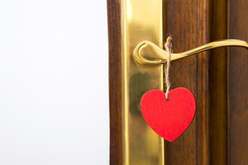 door with heart card hanging