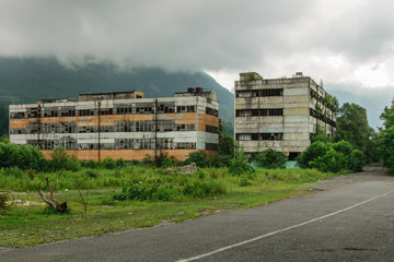 Fototapeta premium Abandoned buildings in Tkvarcheli, Abkhazia