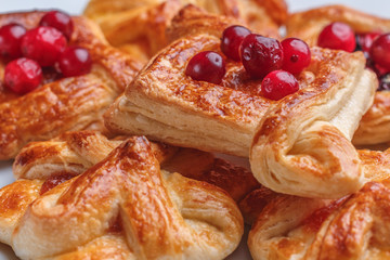 puffs on a plate with different fillings and shapes