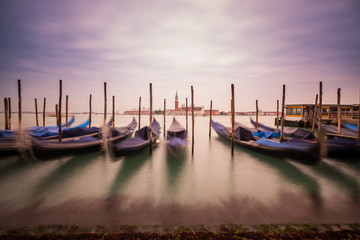 Long Exposure of Traditional Venetian Gondolas in Venice, Italy