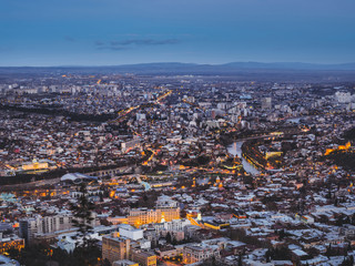 aerial view of city in Georgia and sky at sunset