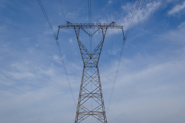 POWER ENGINEERING - High-voltage line fastened on a great tower truss