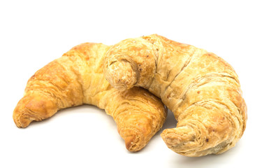 Fresh croissant isolated on a white background closeup of file with Clipping Path .