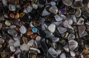 background from multicolored polished stones background
