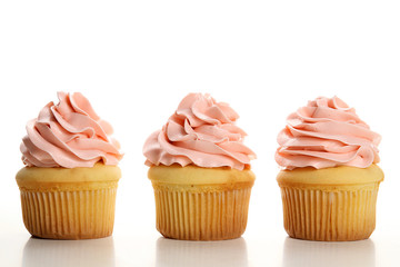 Beautiful cupcakes on a white background