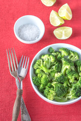 Bowl of cooked broccoli with seasonings © alex9500