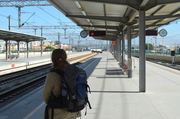 Woman waiting at the train station