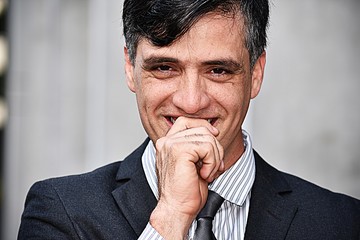 Young Entrepreneur Deciding Wearing Business Suit