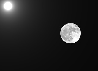 full moon and the sun in the same frame