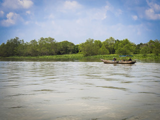 Boat sailing through the mekong delta