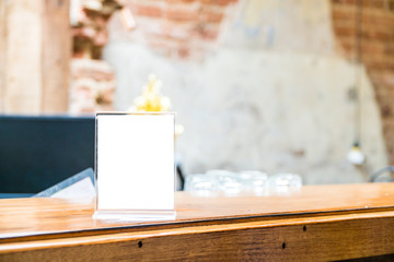 mock up menu object in cafe and restaurant,blank booklet with white sheets of paper on wooden table on cafeteria,promotion and information for business mock up.