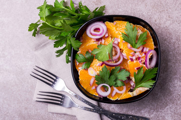 Italian Sicilian orange salad with onion, parsley. Copyspace, top view.
