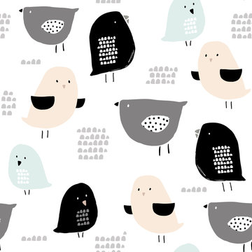 Seamless pattern with hand drawn tiny birds. Trendy scandinavian vector background. Perfect for kids apparel,fabric, textile, nursery decoration,wrapping paper