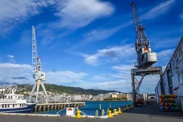 Fototapeta na wymiar Crane in Wellington harbour docks, New Zealand