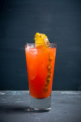 Sweet cocktail with pineapple and rum. Selective focus.