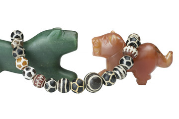 Beautiful valuable Pyu ancient round shaped etched agate and etched carnelian beads in necklace on big Nephrite and Carnelian Pyu tigers ancient beads isolated on white background