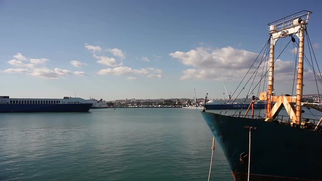 Old fisherboat docked in the Catania pier