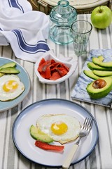 Egg breakfast with salmon and avocado. Healthy breakfast.