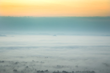  Mountainous landscape with golden sky and beautiful mist,Phu Tho Chiang Khan,Loei.