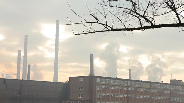 Factory for processing of hot metal and steel, smog in city Ostrava, dust in the air, danger to human health calamity serious situation, quick smoke, exceeding the permitted limits