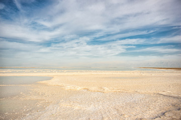 Fototapeta na wymiar Coast of the Dead Sea, sea water and salt