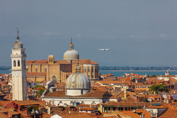 Skyline of Venice with Plane in Backgound