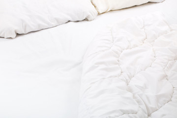 Fototapeta na wymiar white grey soft bed with bedding. pillow, blanket and mattress