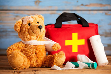 Paediatric healthcare concept with a teddy bear - obrazy, fototapety, plakaty