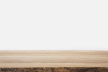 brown striped table on white wall