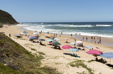 Fototapeta na wymiar Glentana seaside resort on the Garden Route near George Western Cape, South Africa. December 2017. Holidaymakers on the beach with a view of the Indian Ocean.