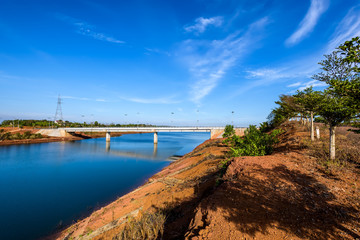 Fototapeta na wymiar The bridge over the river. Daknong province, Vietnam.