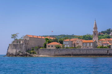 Obraz premium Old Town of Budva town on the Adriatic Sea coast in Montenegro, view with cathedral tower