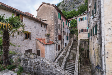 Fototapeta na wymiar Houses and stairs on historical Old Town of Kotor in Montenegro