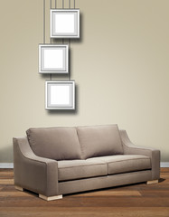 Modern interior with sofa and three hanging alu frame.