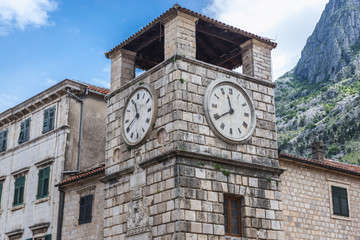 Fototapeta na wymiar 17th century clock tower on the Oruzja main square of Old Town in Kotor, Montenegro