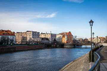 Naklejka premium Mlynski bridge over the Odra river and Mlynska island in Wroclaw, Silesia, Poland