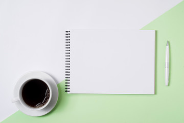 Business image. Pastel office desk table with laptop, and supplies. Top view with copy space