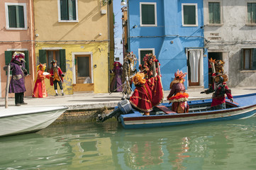 Fototapeta na wymiar Colorful carnival masks at a traditional festival in Venice.