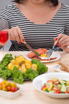 Cropped image of asian woman have breakfast