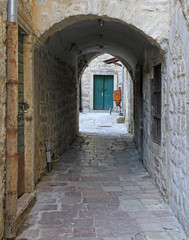narrow arch passage in the old town of Kotor
