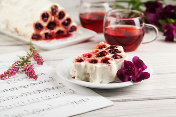 Pancakes with cherries and tea. Breakfast.