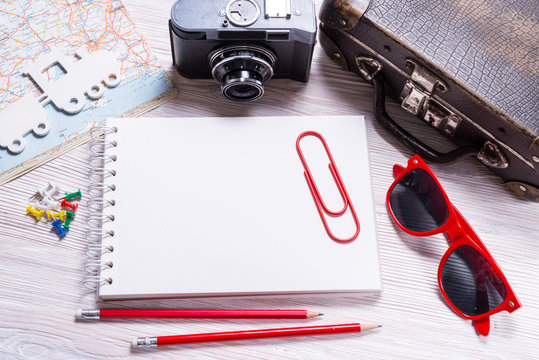 Traveling planning, paper notebook and accessories