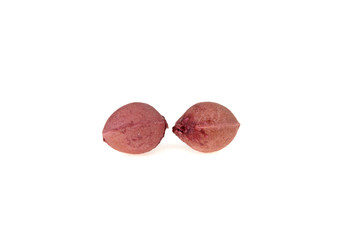 two cherry stones isolated on white background