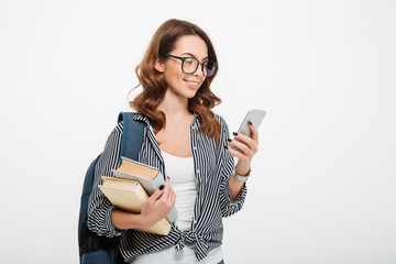 Portrait of a happy casual girl student with backpack