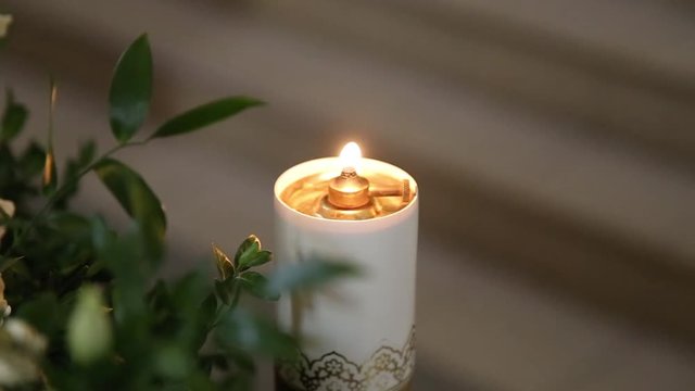 Candles flaming in candlestick