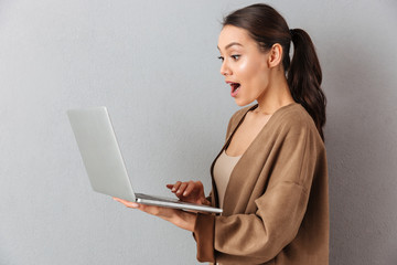 Portrait of a surprised young asian woman