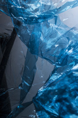 Plastic Shiny See Through Abstract Shimmer Creased Background Blue