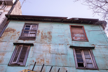 Buenos Aires, Argentina - August 16, 2017: Busy street with colorful houses and terraces near Caminito in La Boca