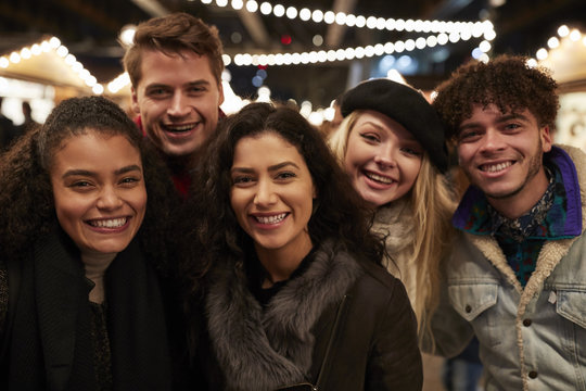 Young Friends Posing For Selfie At Christmas Market
